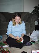 Christy opening a gift from Mom & Dad K (88KB)